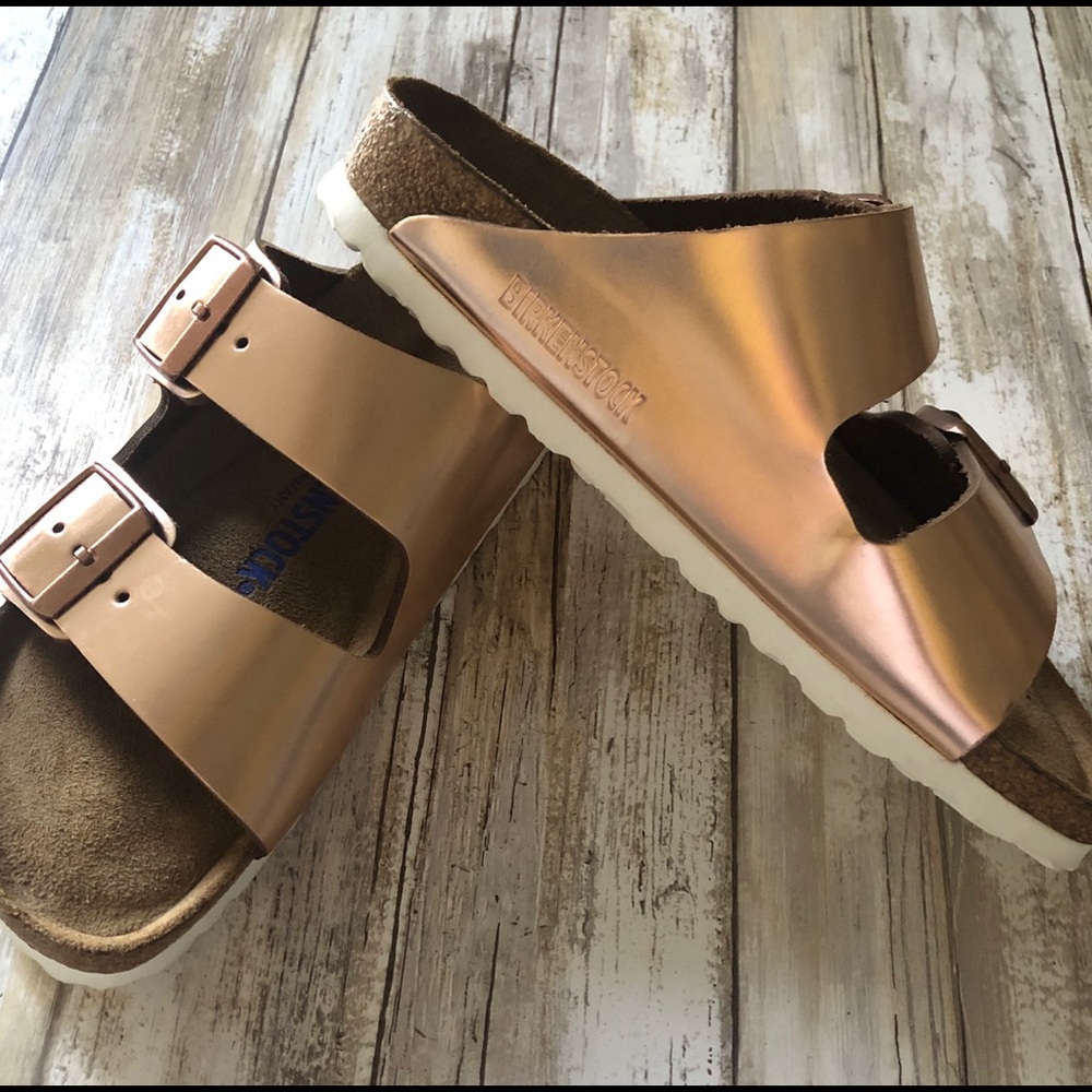 Birkenstock Arizona Metallic Copper sandals.